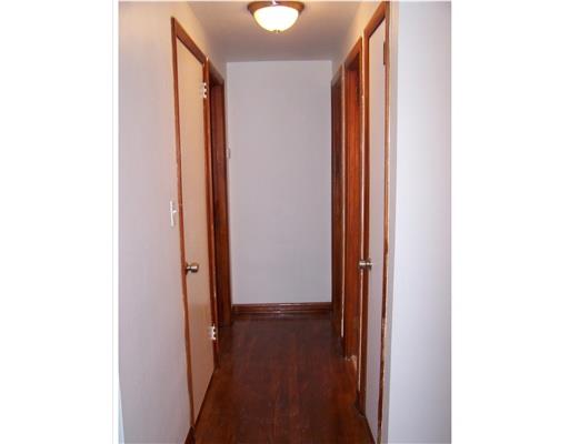 176 Poplar Ridge Road Penn Hills, PA 15235 - Photo 6 of 14 Other. Hallway leading to the bedrooms and bath on the first floor.