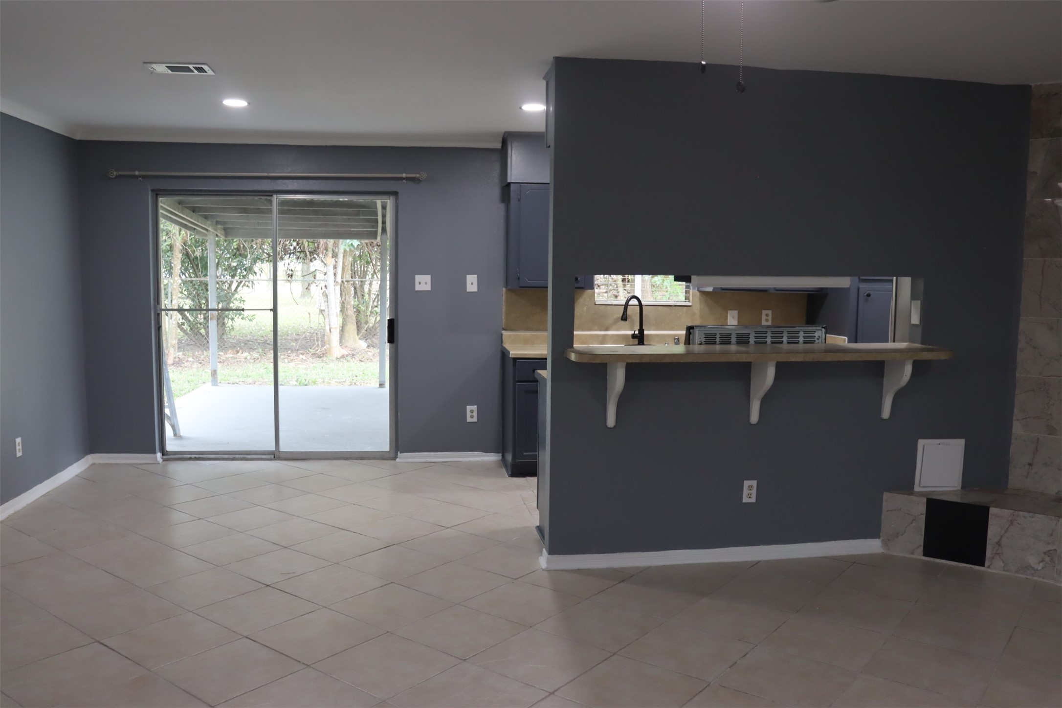 12507 New Rochelle Court Houston, TX 77089 - Photo 8 of 12 a view of kitchen with a sink cabinet and window