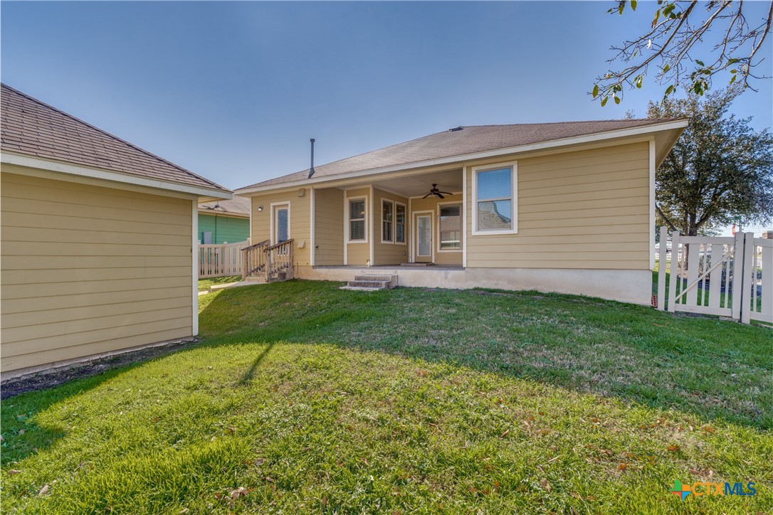 1019 Powell Kyle, TX 78640 - Photo 17 of 17 a front view of house with yard and green space