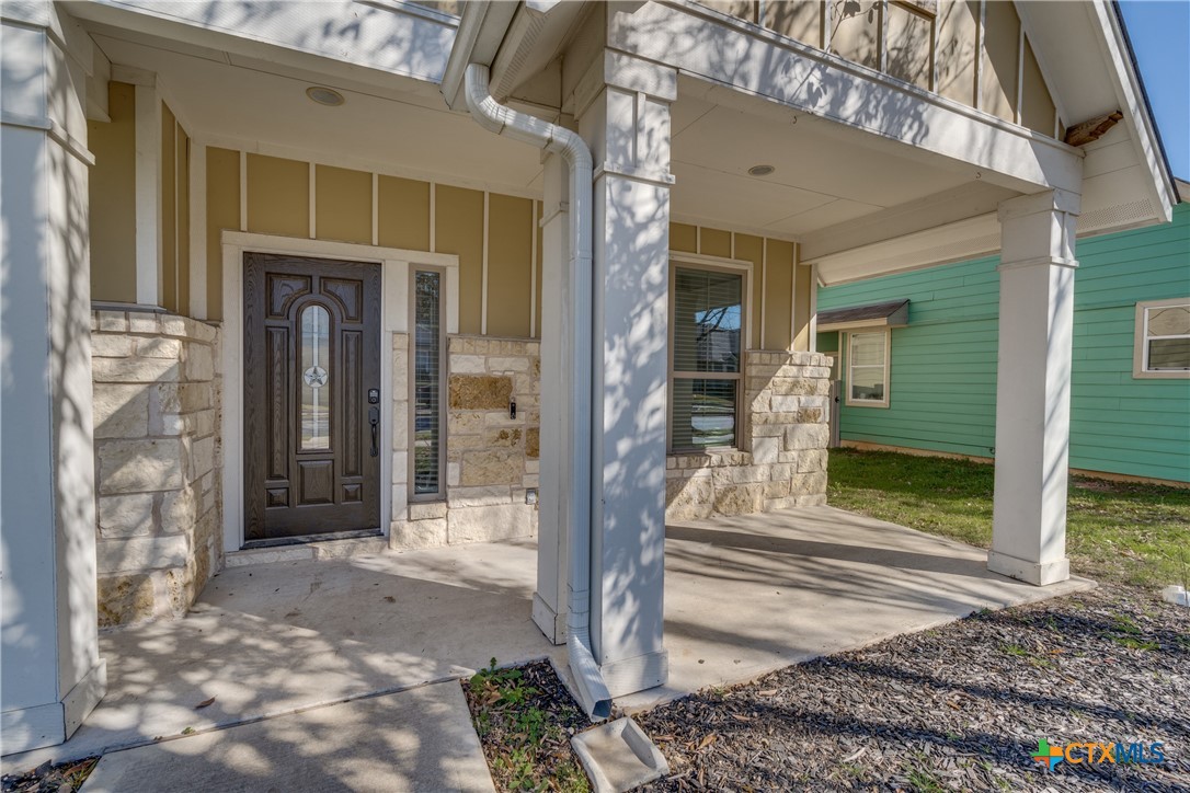 1019 Powell Kyle, TX 78640 - Photo 2 of 17 a view of a entryway door front of house
