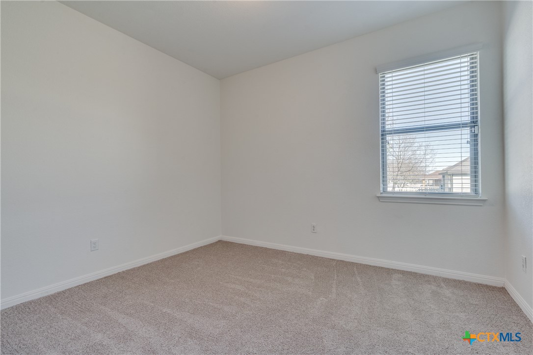 1019 Powell Kyle, TX 78640 - Photo 10 of 17 an empty room with a window