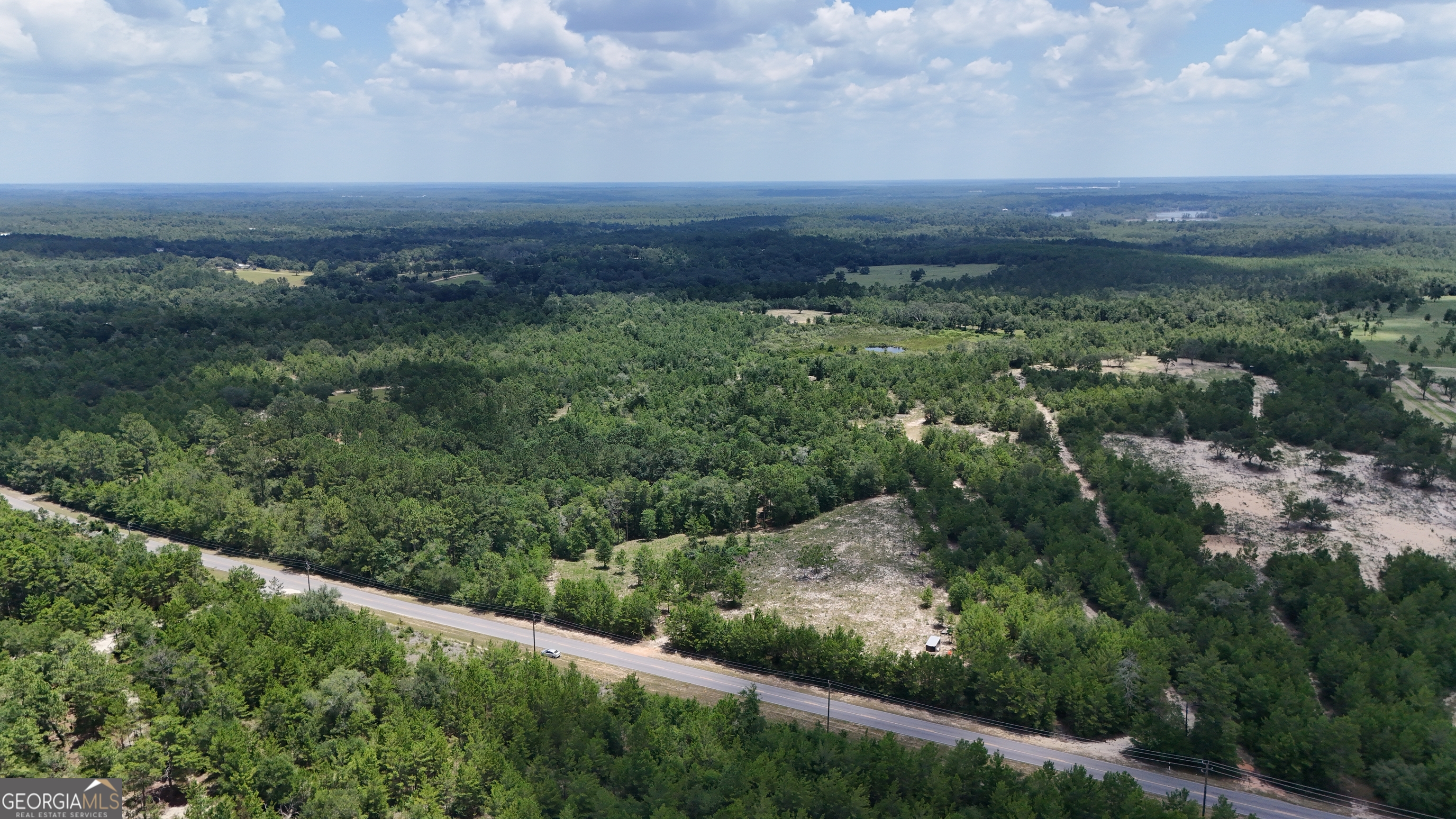 10.29-acres Holmes Valley Road Vernon, FL 32462 - Photo 11 of 13 an aerial view of residential houses with outdoor space and trees