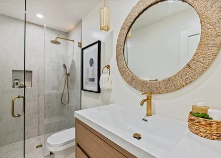 a bathroom with a double vanity sink and a mirror