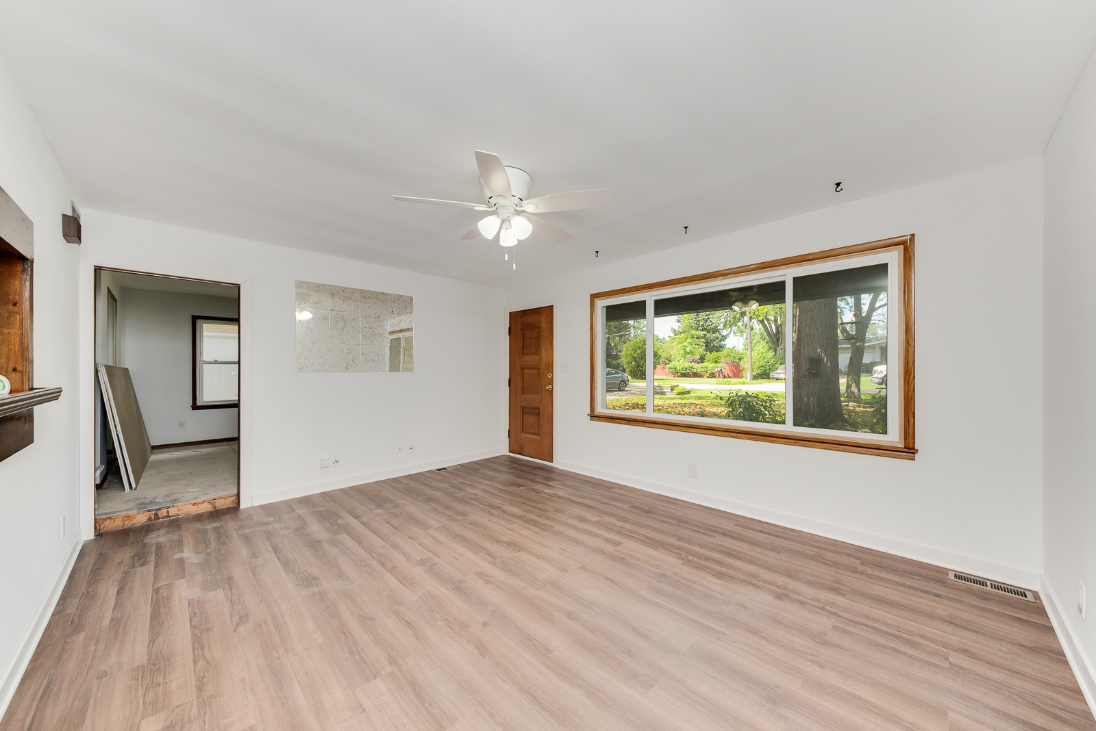 318 East North Street Lockport, IL 60441 - Photo 6 of 14 a view of an empty room with a window