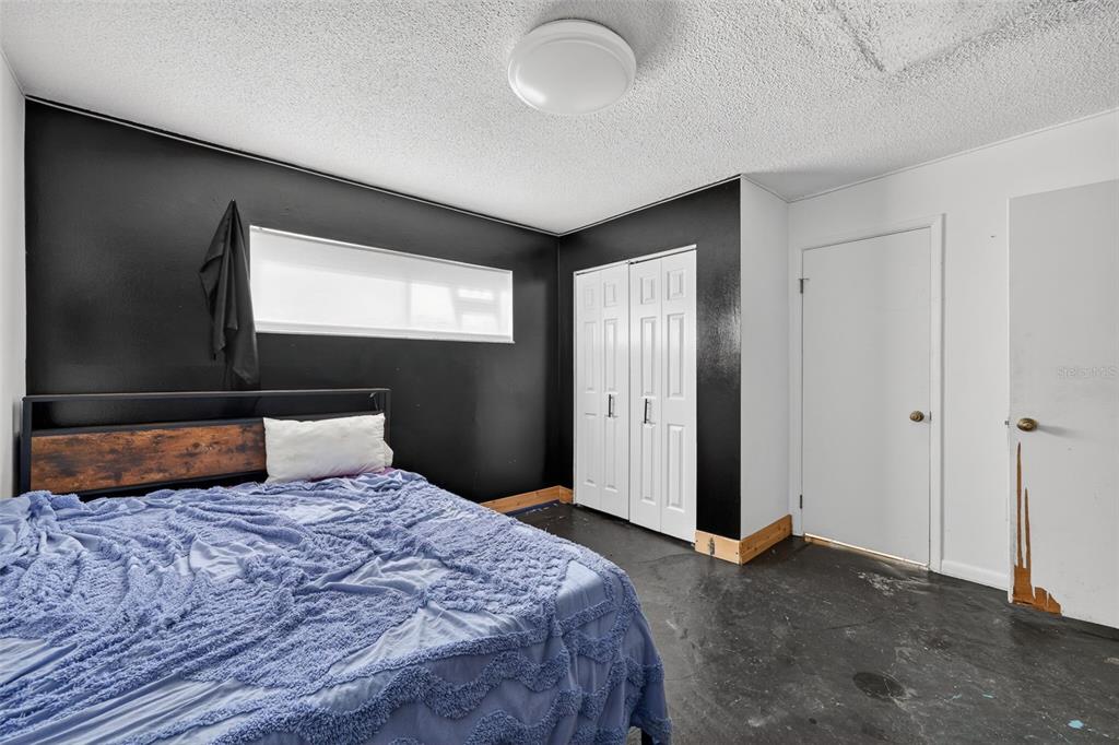 3010 Shepherd Road Mulberry, FL 33860 - Photo 22 of 28 a bedroom with a bed and a window