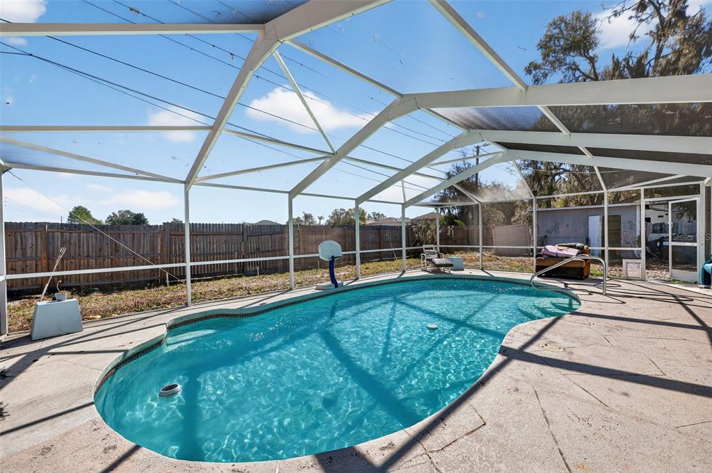 3010 Shepherd Road Mulberry, FL 33860 - Photo 27 of 28 a view of a swimming pool with a patio