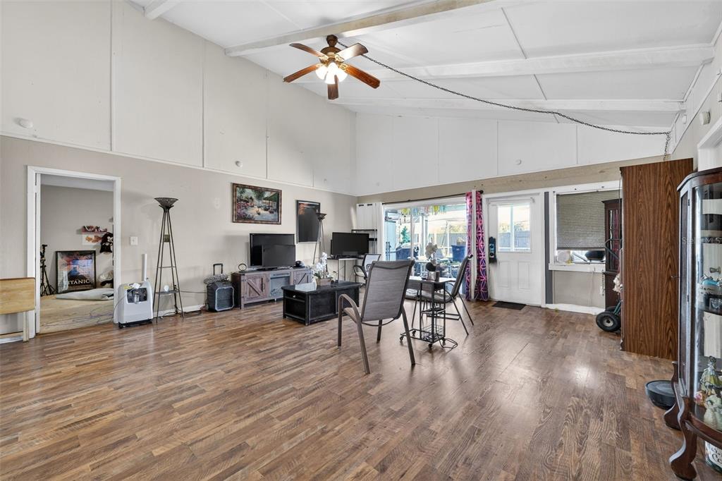 3010 Shepherd Road Mulberry, FL 33860 - Photo 4 of 28 a living room with furniture and a wooden floor