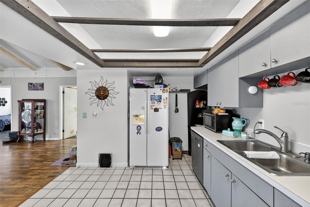 3010 Shepherd Road Mulberry, FL 33860 - Photo 9 of 28 a kitchen with refrigerator and sink