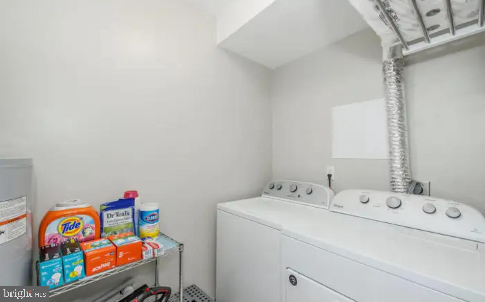 3919 El Soneta Place, Unit 9 Alexandria, VA 22309 - Photo 14 of 17 a utility room with dryer and washer