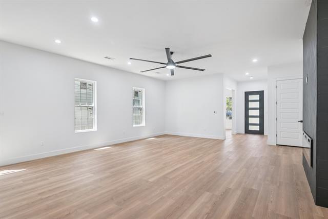 2936 Henry Road Lancaster, TX 75134 - Photo 4 of 28 Recessed lighting, wood-finish flooring, and a contemporary ceiling fan