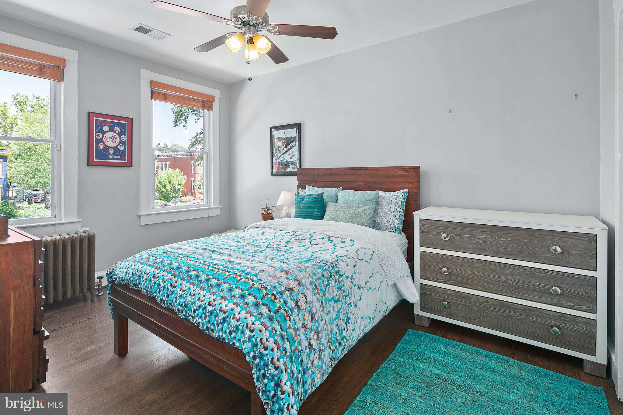 925 K Street Northeast Washington, DC 20002 - Photo 22 of 35 a bed sitting in a bedroom next to a window