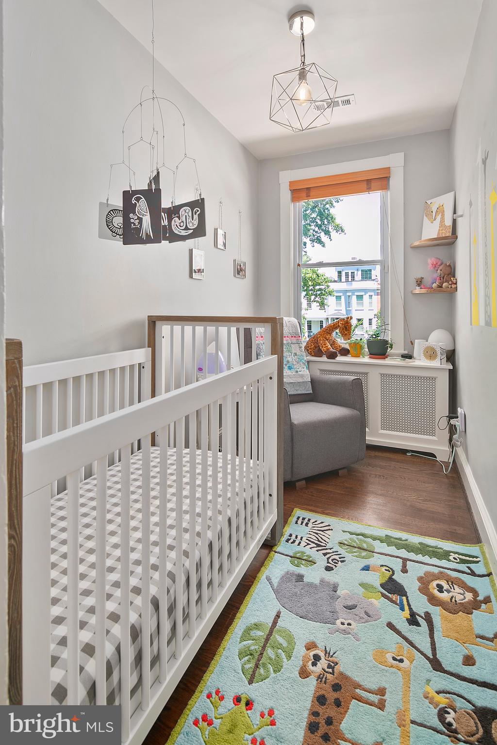 925 K Street Northeast Washington, DC 20002 - Photo 24 of 35 a bedroom with furniture and a window