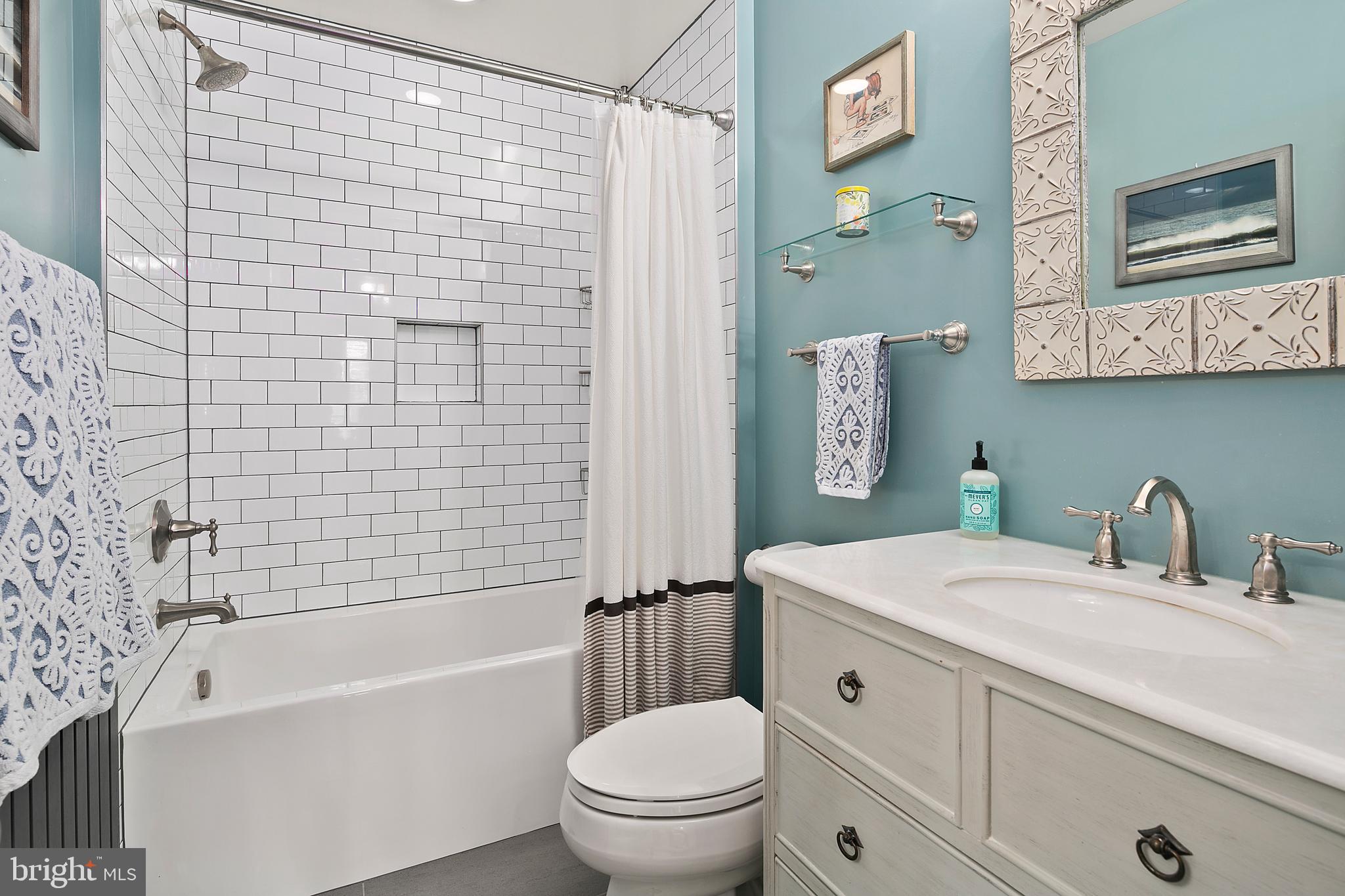 925 K Street Northeast Washington, DC 20002 - Photo 25 of 35 a bathroom with a sink a toilet and a bathtub