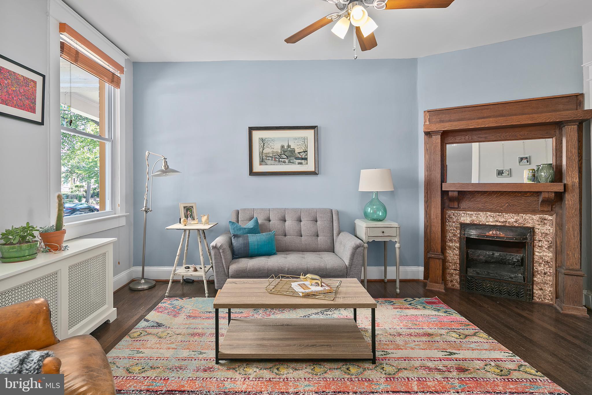 925 K Street Northeast Washington, DC 20002 - Photo 5 of 35 a living room with furniture and a fireplace