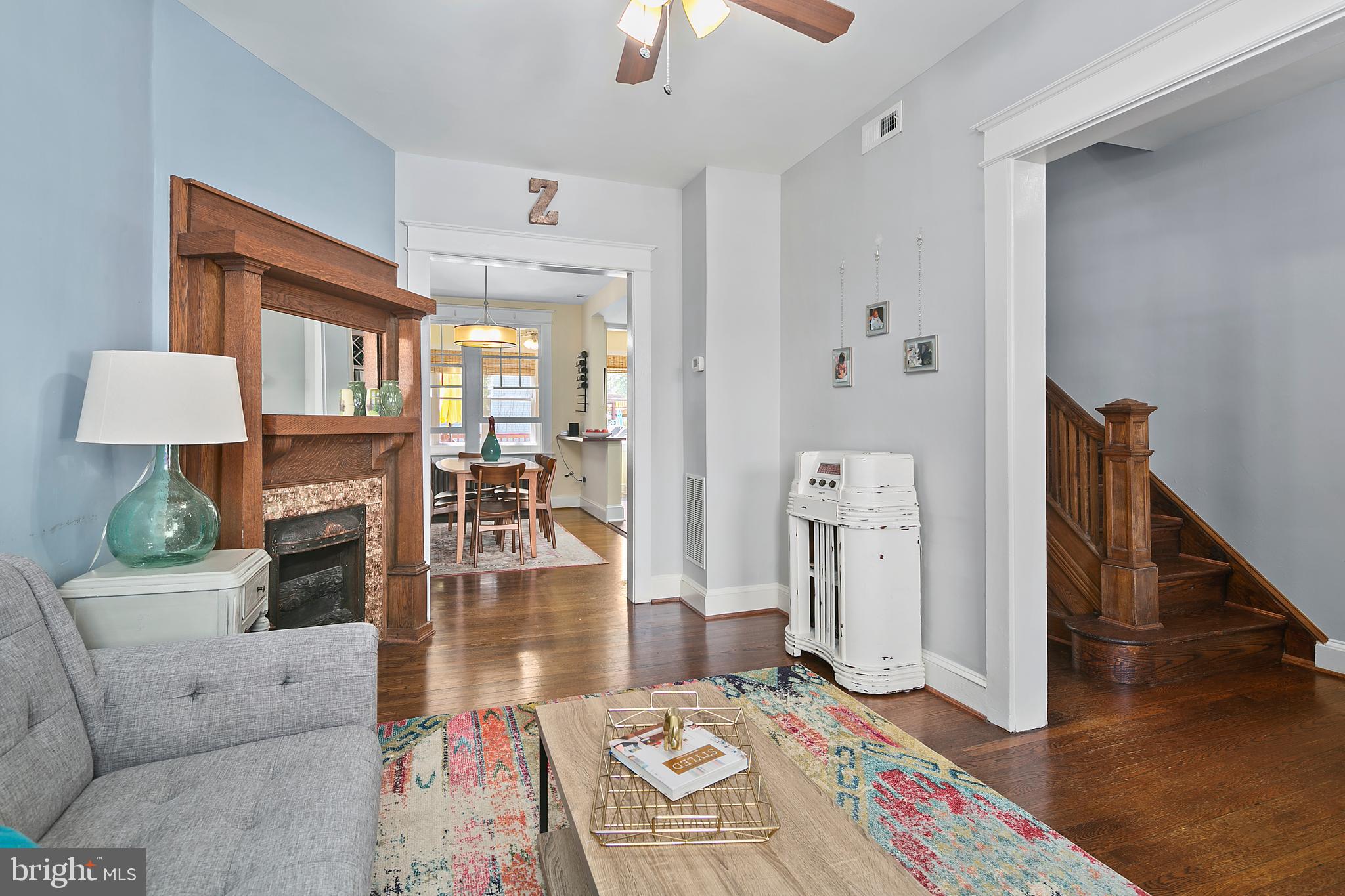 925 K Street Northeast Washington, DC 20002 - Photo 8 of 35 a living room with furniture and a chandelier