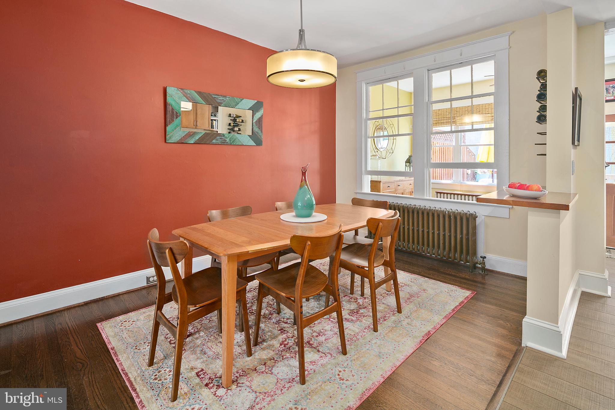 925 K Street Northeast Washington, DC 20002 - Photo 10 of 35 a dining room with furniture a chandelier and wooden floor