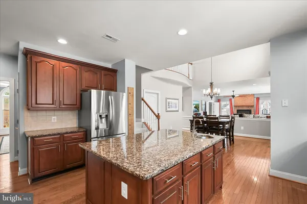 a large bathroom with a large tub and double vanity