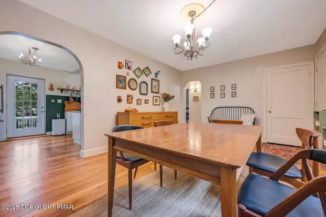 a kitchen with a stove a sink and cabinets