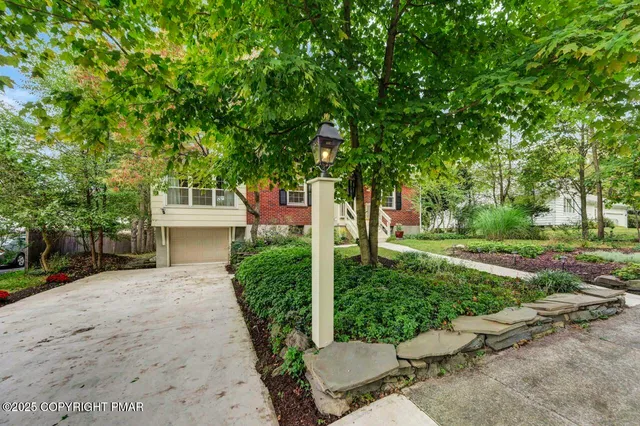 a view of backyard with green space
