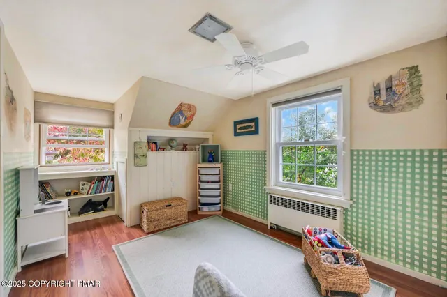 a view of a room with toys and a window
