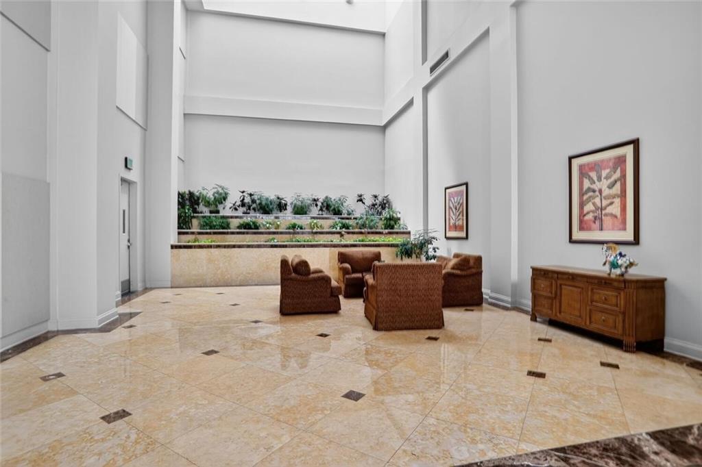 1280 West Peachtree Street Northwest, Unit 3014 Atlanta, GA 30309 - Photo 21 of 33 a living room with furniture