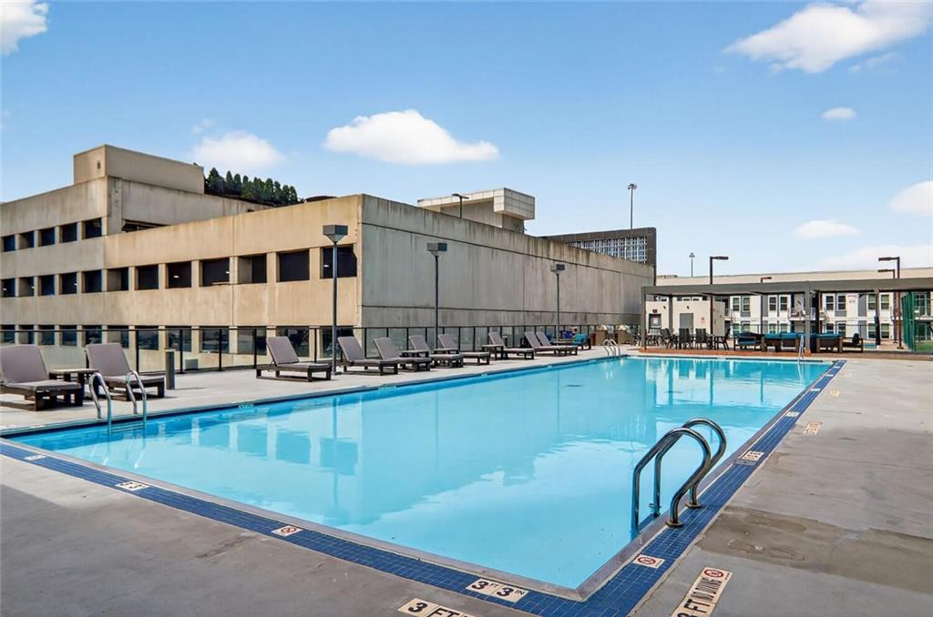 1280 West Peachtree Street Northwest, Unit 3014 Atlanta, GA 30309 - Photo 25 of 33 a view of a swimming pool with a terrace