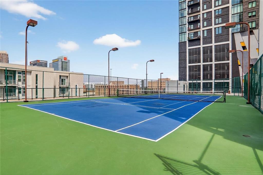 1280 West Peachtree Street Northwest, Unit 3014 Atlanta, GA 30309 - Photo 29 of 33 a view of an outdoor space and tennis court