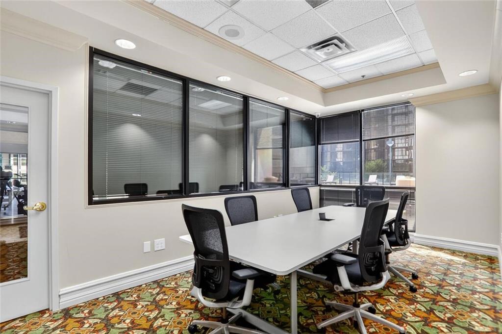 1280 West Peachtree Street Northwest, Unit 3014 Atlanta, GA 30309 - Photo 32 of 33 a view of a dining room with furniture
