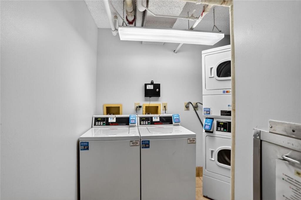 1280 West Peachtree Street Northwest, Unit 3014 Atlanta, GA 30309 - Photo 33 of 33 a utility room with dryer and washer