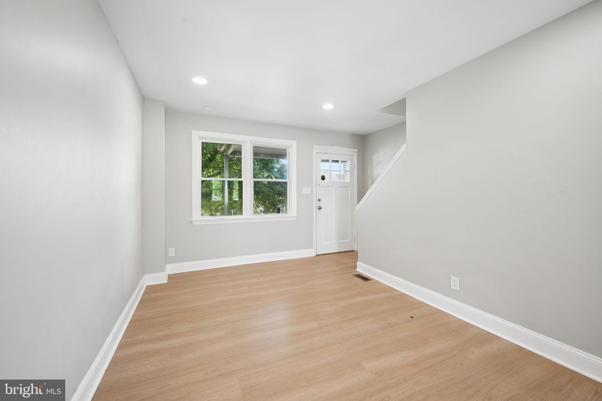 3548 Benzinger Road Baltimore, MD 21229 - Photo 6 of 40 an empty room with windows