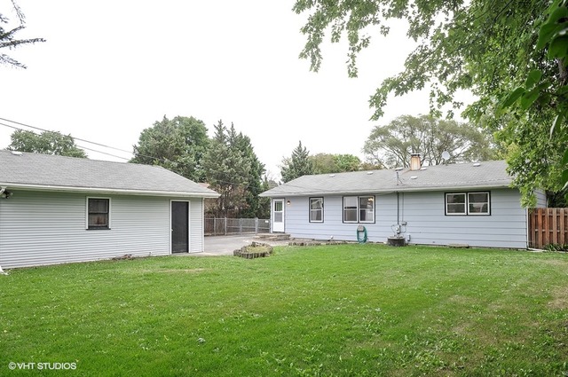 20570 North Clarice Avenue Prairie View, IL 60089 - Photo 10 of 10 a front view of house with yard and green space
