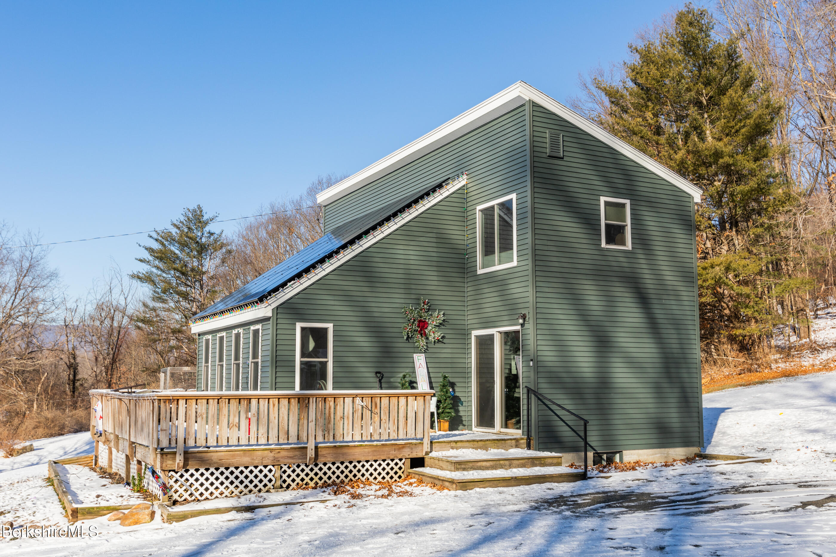 162 North Hoosac Road Williamstown, MA 01267 - Photo 1 of 37 a front view of a house with a garden