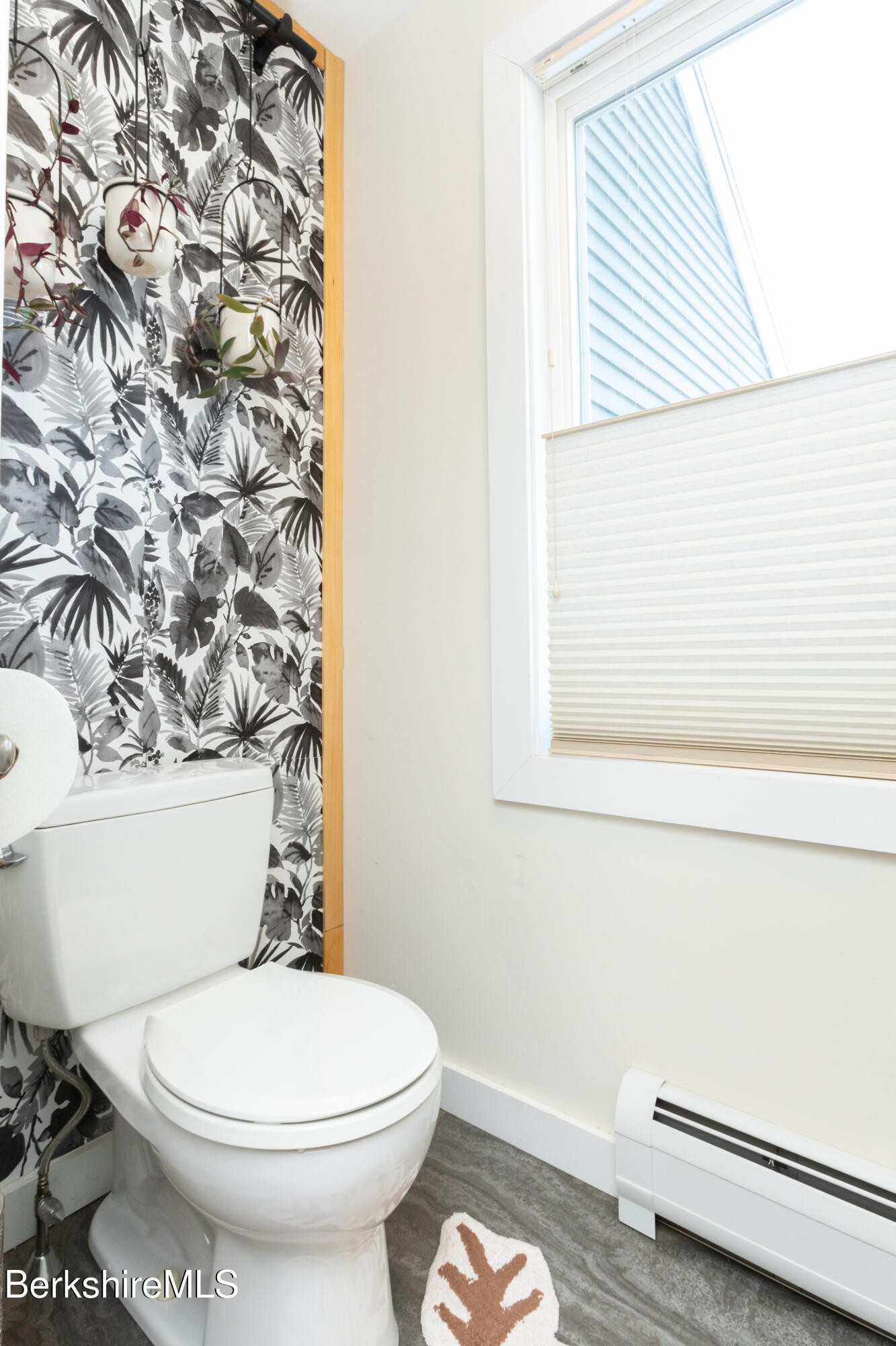 162 North Hoosac Road Williamstown, MA 01267 - Photo 12 of 37 a white toilet sitting next to a shower curtain