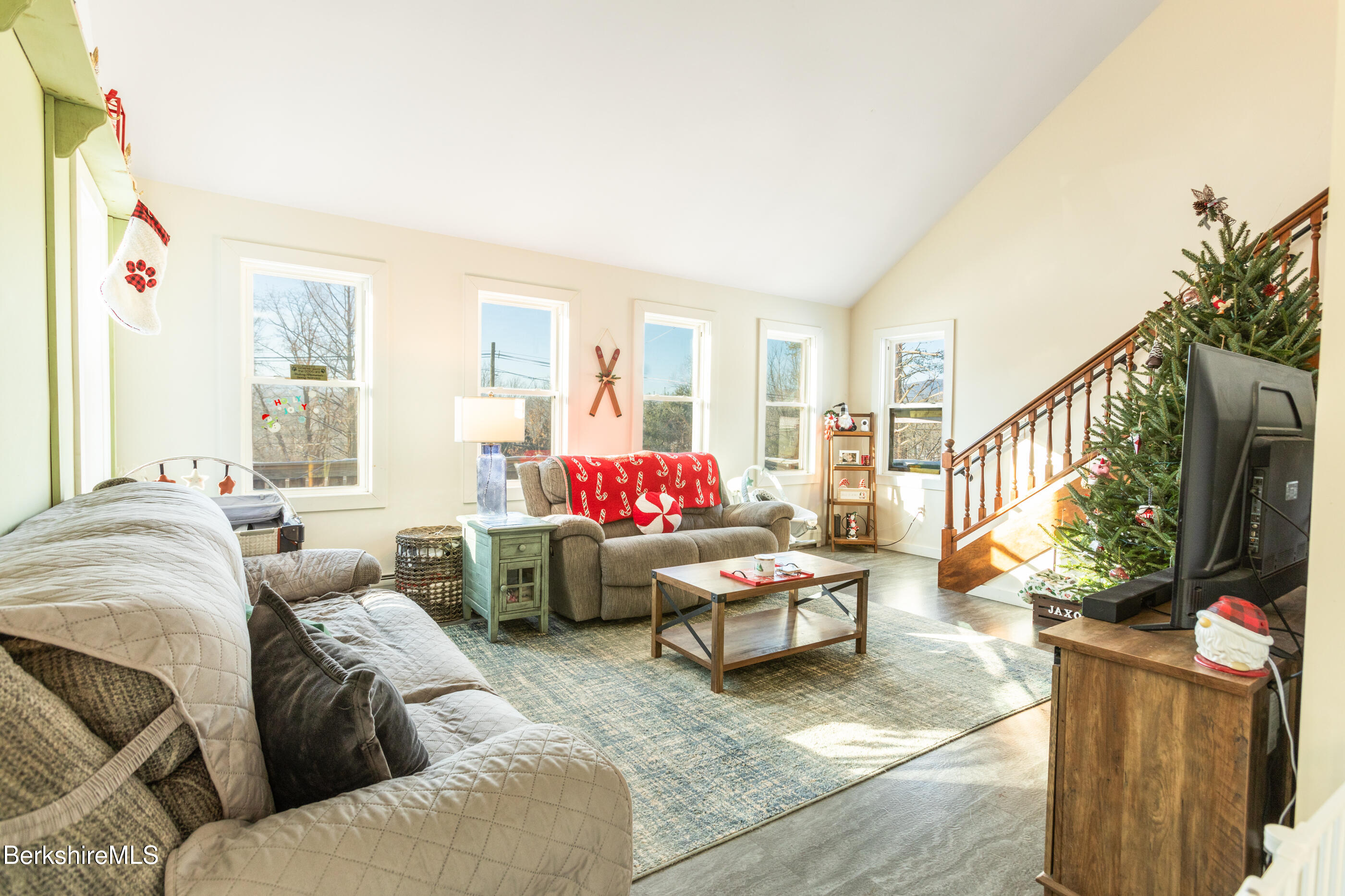 162 North Hoosac Road Williamstown, MA 01267 - Photo 15 of 37 a living room with furniture stairs and a large window
