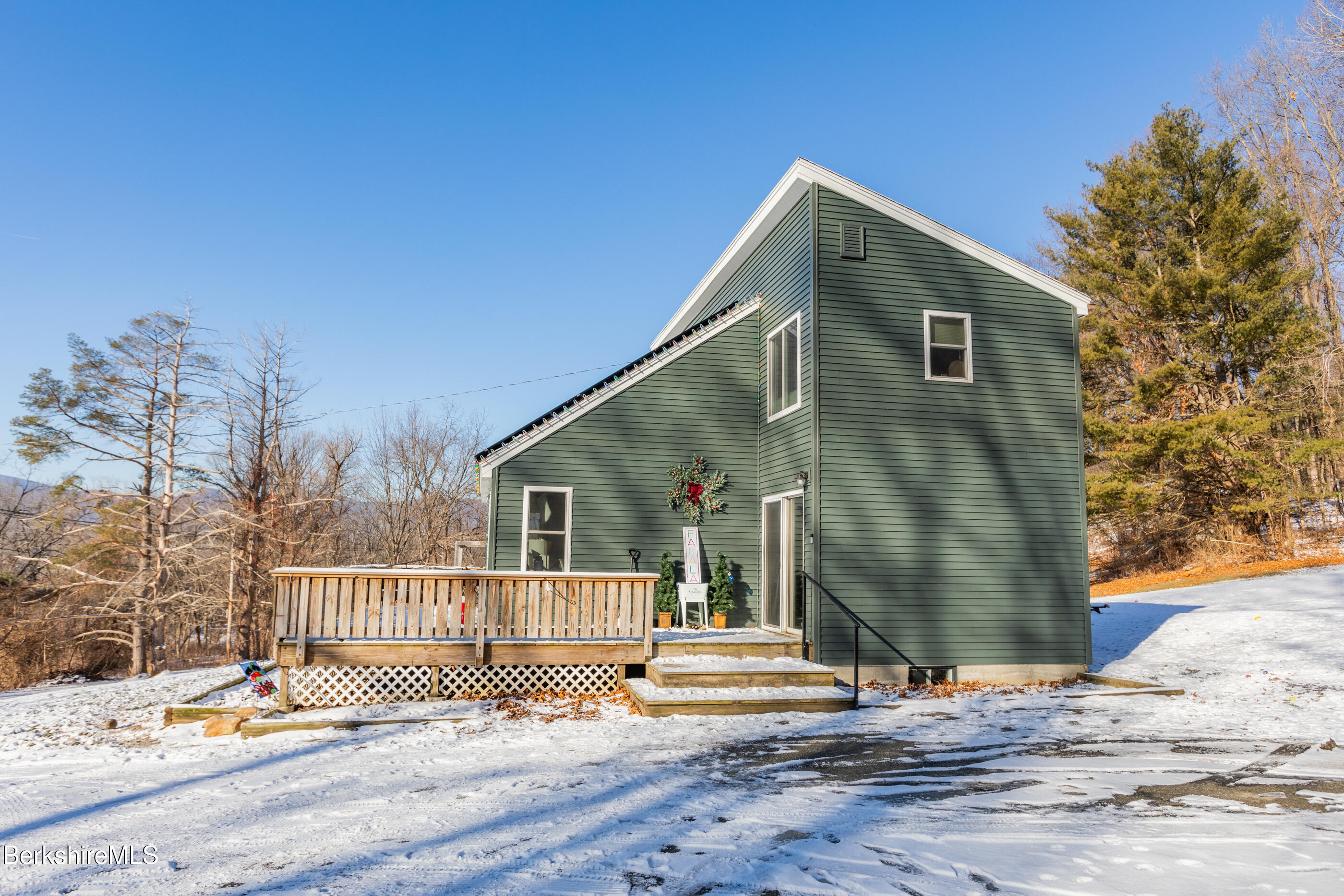 162 North Hoosac Road Williamstown, MA 01267 - Photo 2 of 37 a backyard of a house with wooden floor