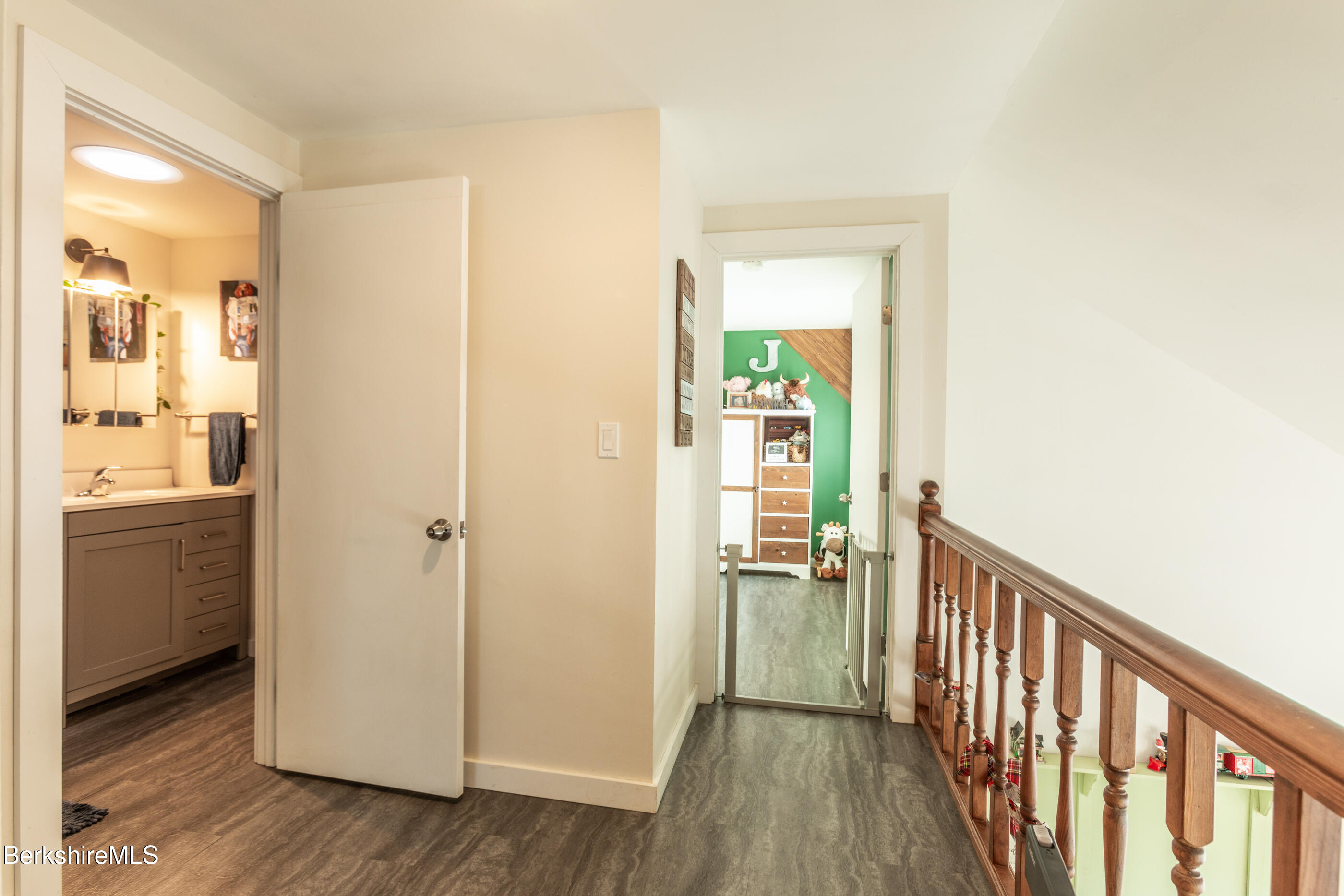 162 North Hoosac Road Williamstown, MA 01267 - Photo 25 of 37 a view of a hallway with wooden floor and a bathroom