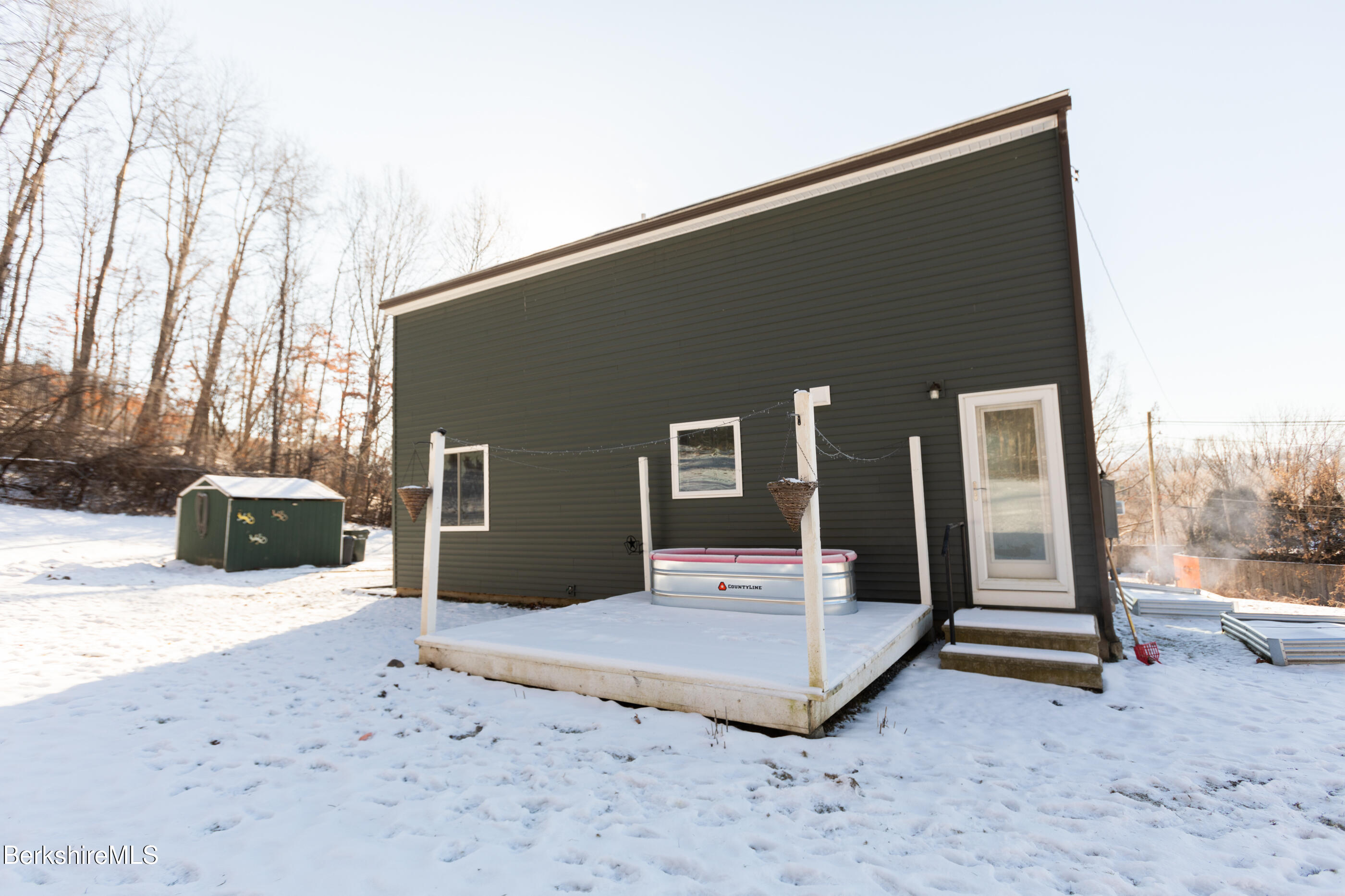 162 North Hoosac Road Williamstown, MA 01267 - Photo 37 of 37 a view of a house with backyard and sitting area