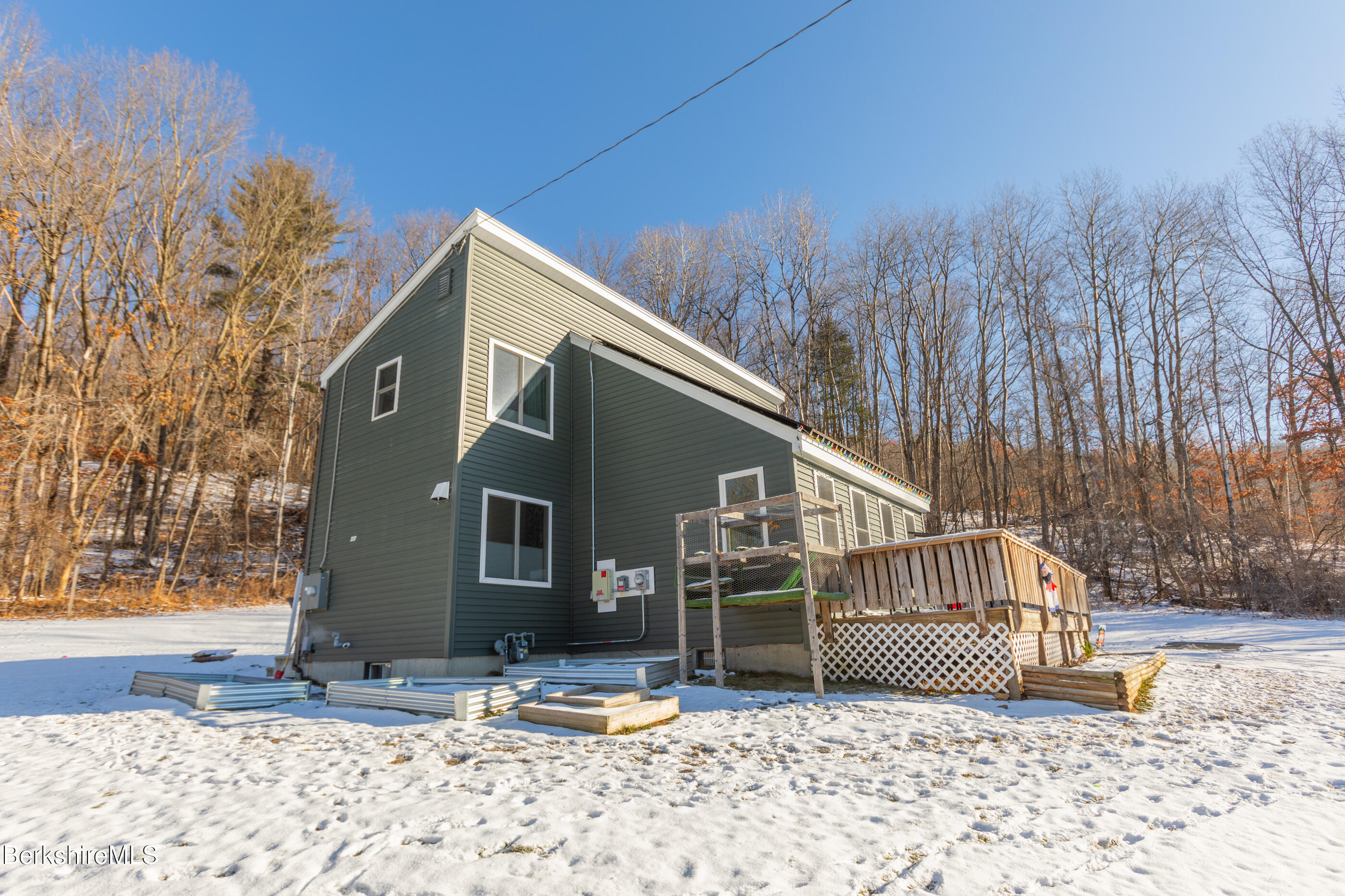 162 North Hoosac Road Williamstown, MA 01267 - Photo 4 of 37 a view of a house with a snow in the yard