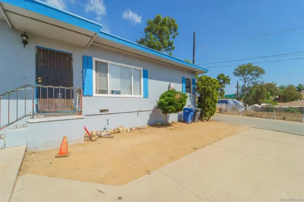 a house with a yard and garage