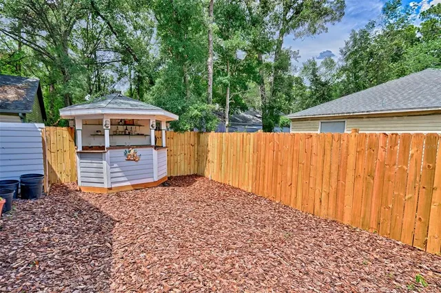 a view of a backyard with a garden