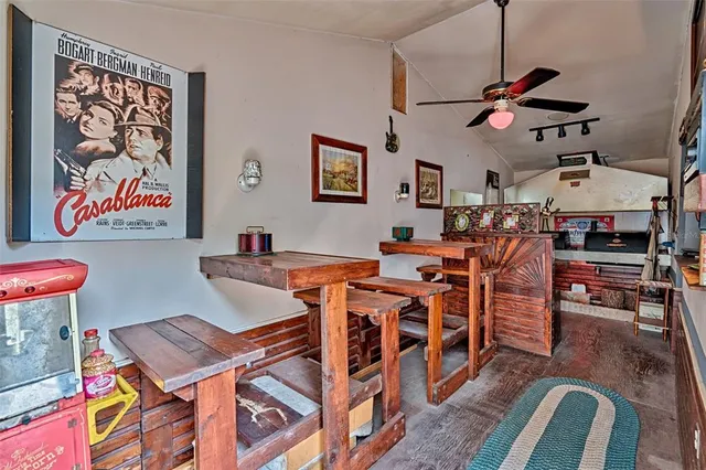 a very nice looking dining room with a table and chairs