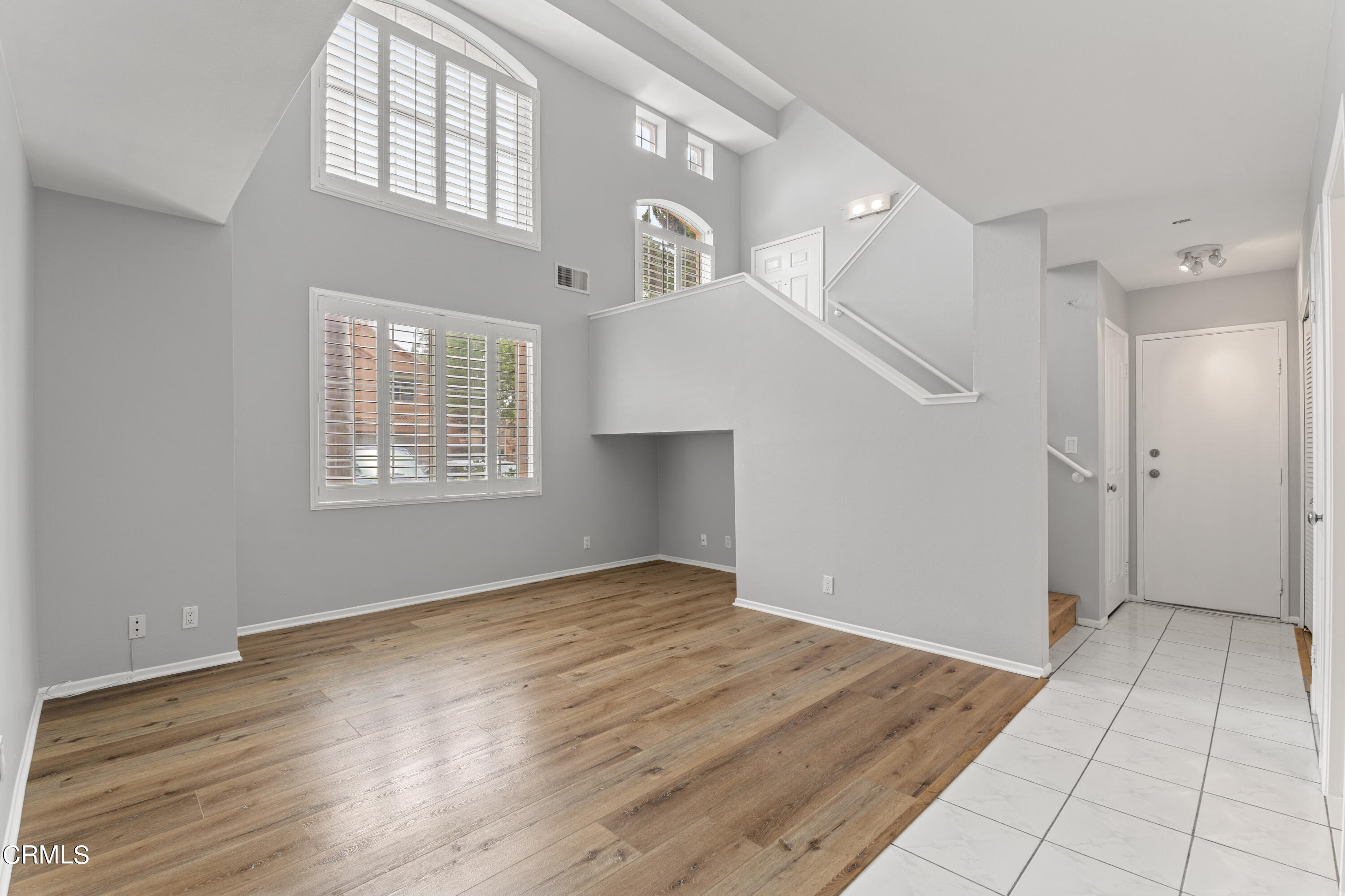 738 Moby Dick Lane Oxnard, CA 93030 - Photo 13 of 48 wooden floor in an empty room with a window