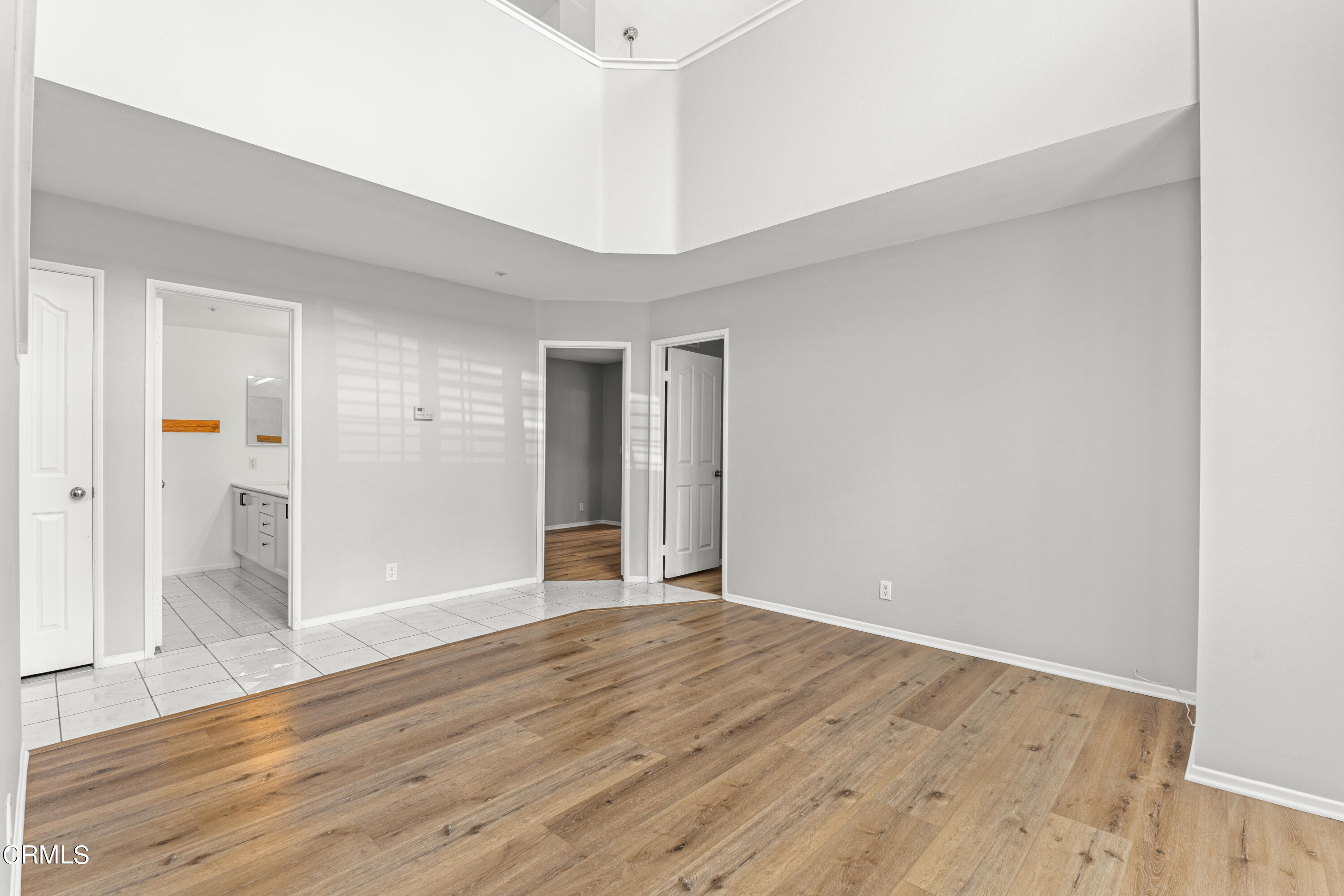 738 Moby Dick Lane Oxnard, CA 93030 - Photo 15 of 48 a view of an empty room with wooden floor