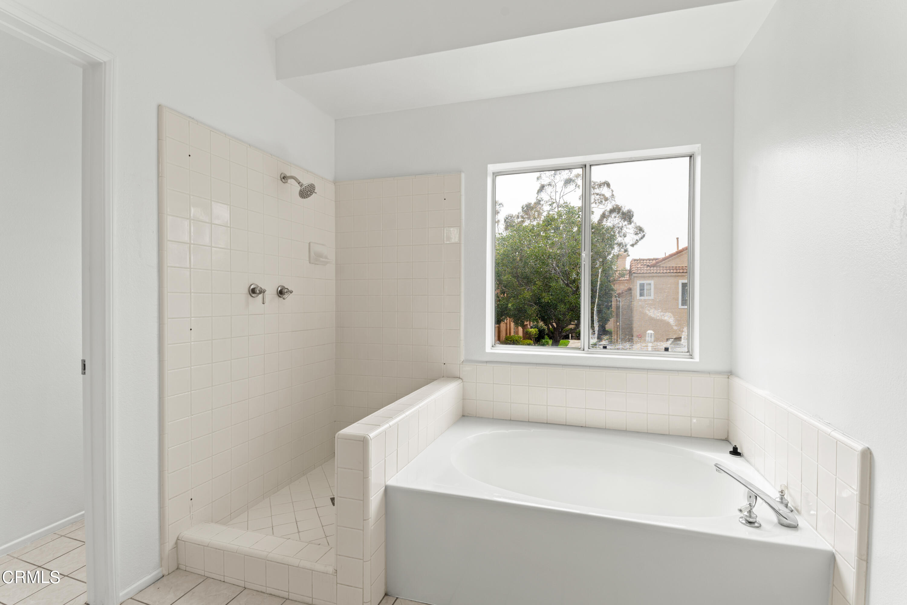 738 Moby Dick Lane Oxnard, CA 93030 - Photo 23 of 48 a white bath tub sitting next to a window