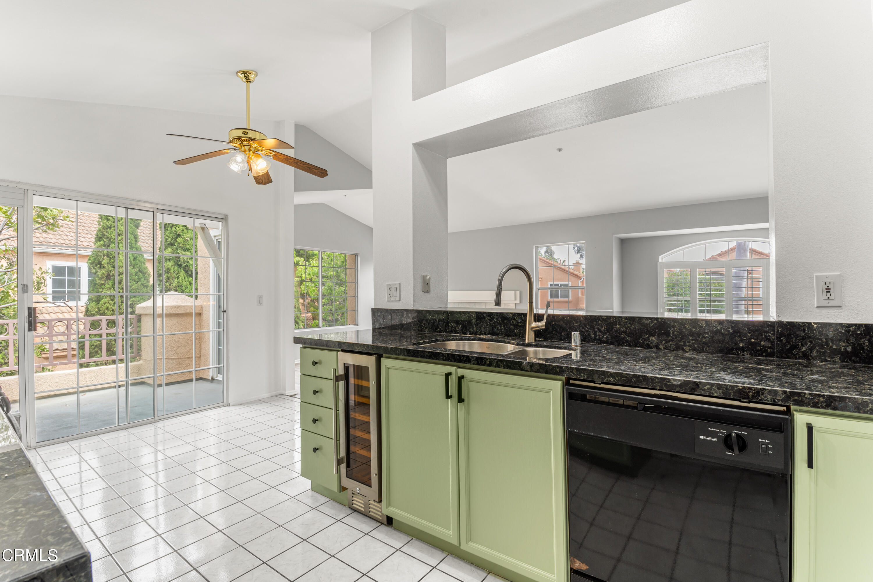 738 Moby Dick Lane Oxnard, CA 93030 - Photo 35 of 48 a kitchen with a sink a counter top space appliances and cabinets