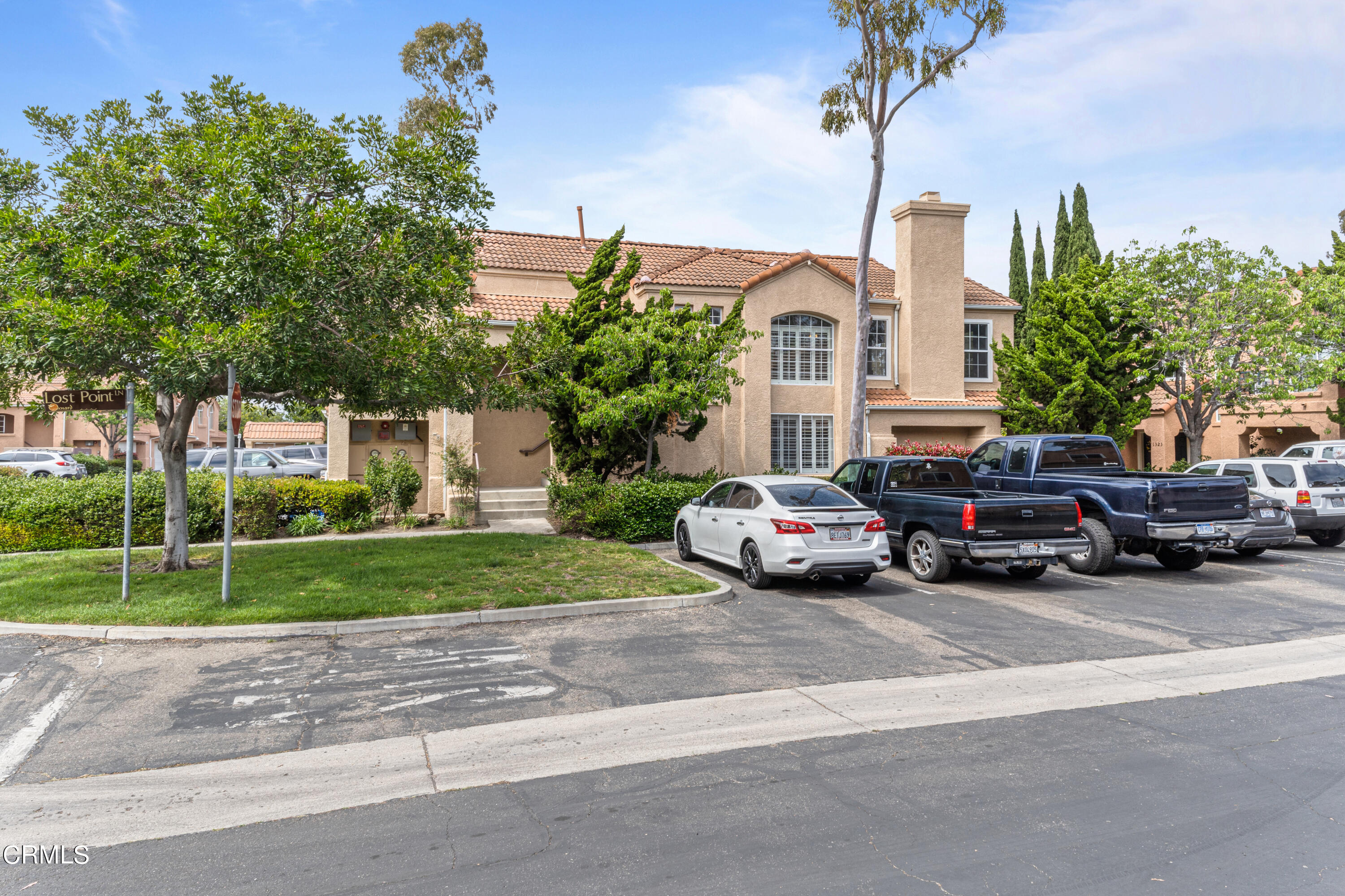 738 Moby Dick Lane Oxnard, CA 93030 - Photo 4 of 48 a view of a cars parked in front of a house