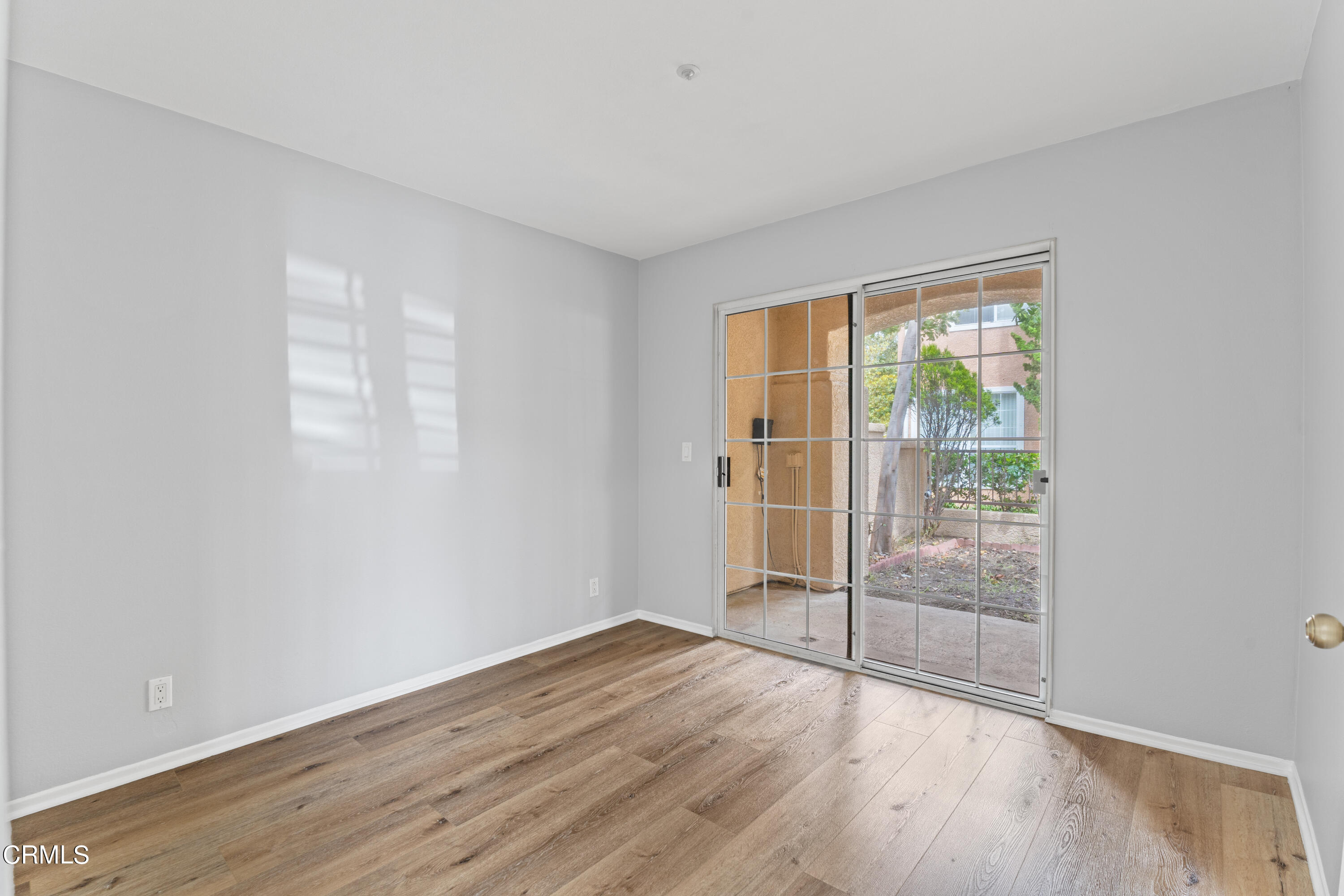 738 Moby Dick Lane Oxnard, CA 93030 - Photo 46 of 48 a view of wooden floor and windows in a room