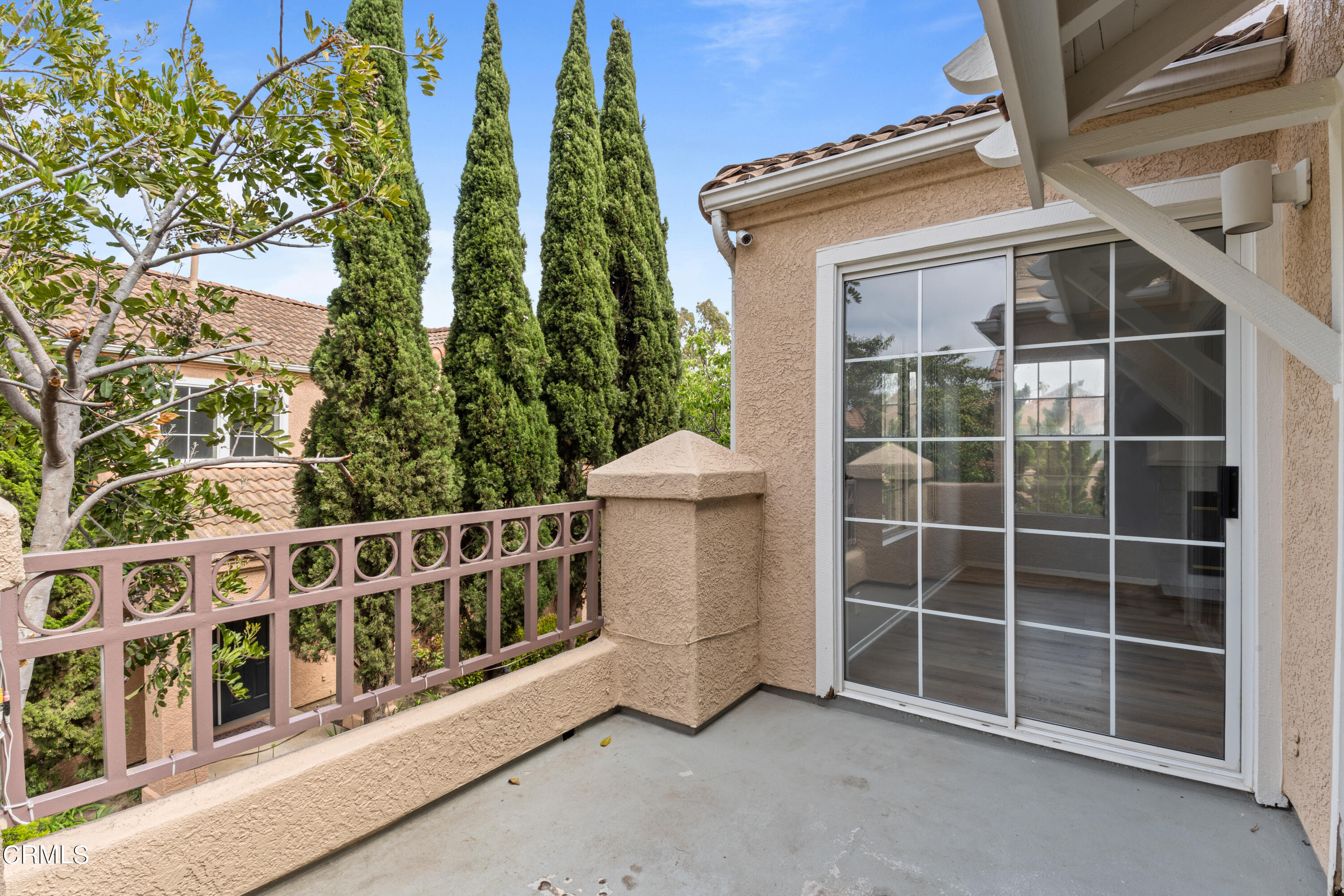 738 Moby Dick Lane Oxnard, CA 93030 - Photo 5 of 48 a view of a blue house with a large window
