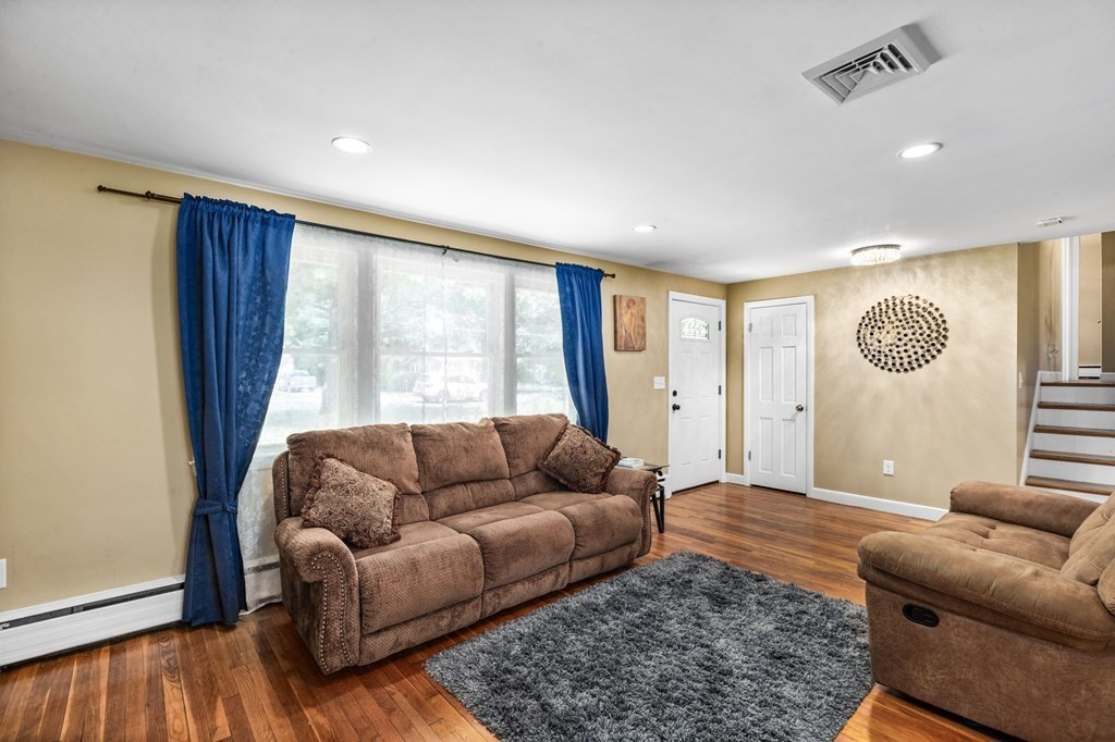 17 Pinetree Road Stoughton, MA 02072 - Photo 13 of 34 a living room with furniture and a window