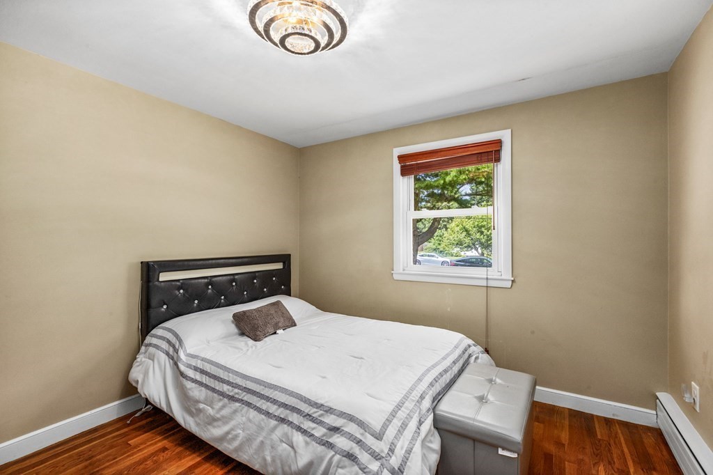 17 Pinetree Road Stoughton, MA 02072 - Photo 16 of 34 a bedroom with a bed and a window